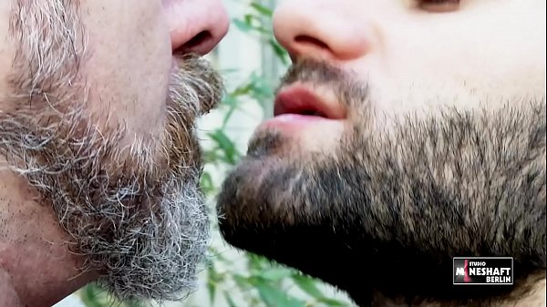 Two men meet on the street