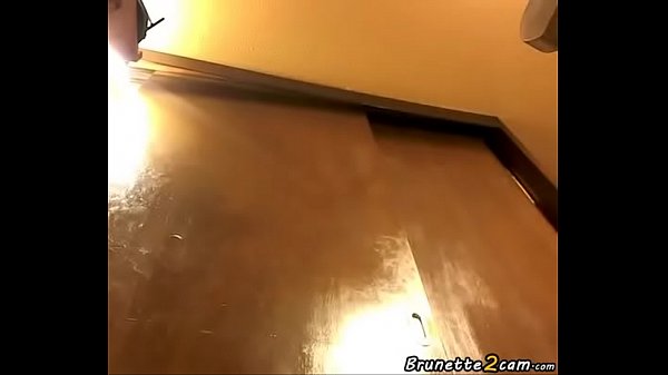 Curly brunette masturbation from the floor