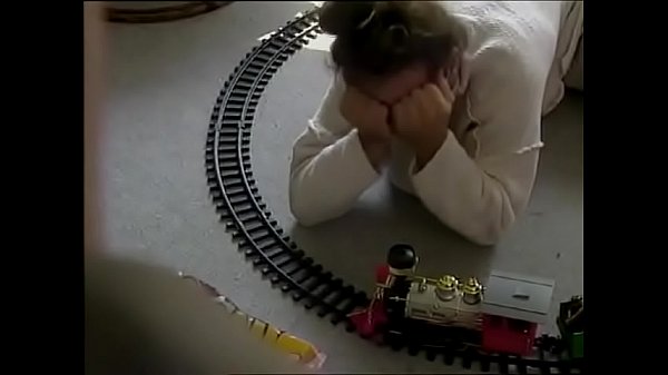 Blonde hottie fucked in the ass by a guy playing with a train set