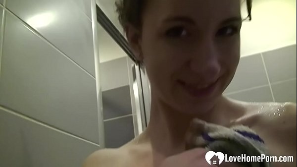 Horny teen loves to play with her hairy wet pussy while being in the shower.