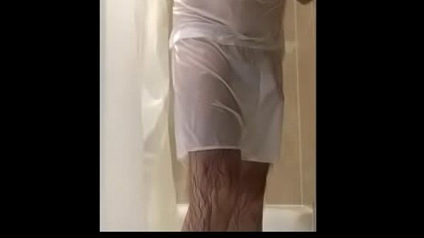 Man strips from wet tee shirt and white boxers and masturbates in the shower