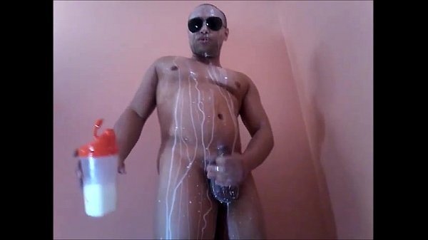 5 - Brawny dude pours milk onto his body and makes his own afterwards