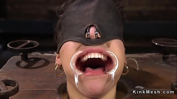 Gagged brunette slave anal hooked till bare feet tormented