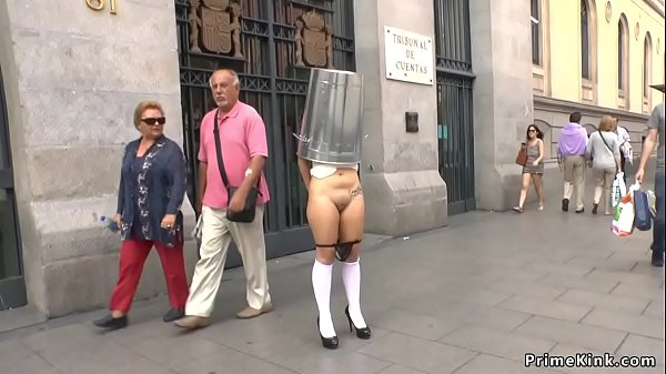 Natural big tits Spanish slave d. in public streets with trash cane on her head