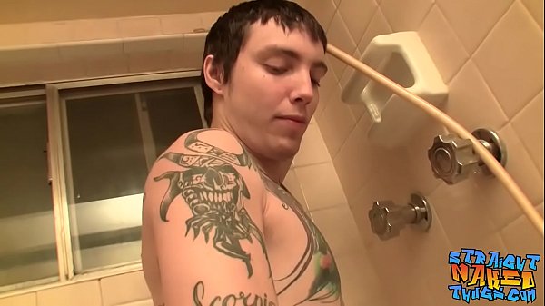 Inked twink wanks and cums in the shower