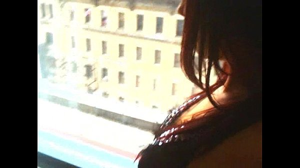 Nyli Summer teases in front of a window for all her fans in NYC.