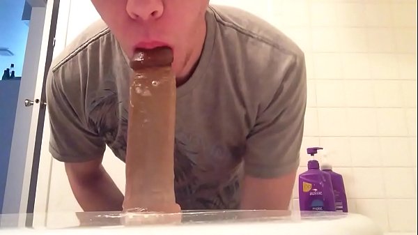 Blonde amateur guy sucking dildo