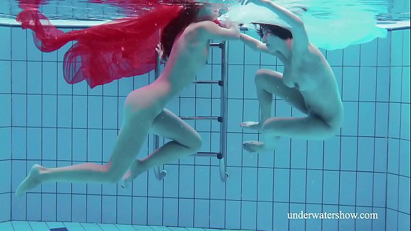 Swimming pool fun with two lesbos