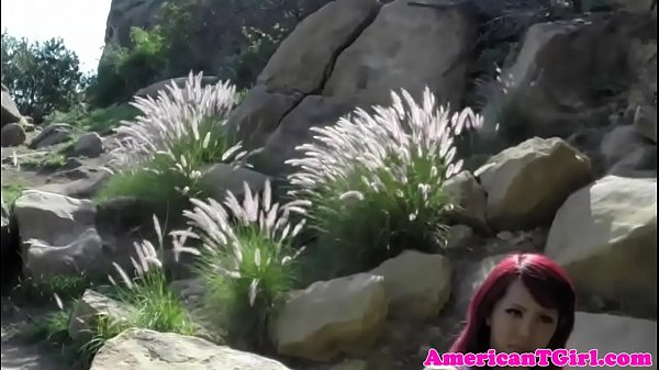 Red hair transbabe shows tits outdoors