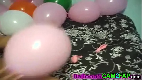 Balloon Blowing Teen with Big Tits