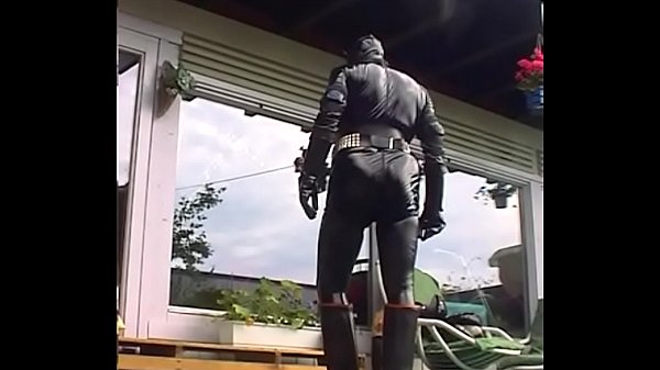 RubberOxxxInTurnedDownRubberBoots2003.WMV