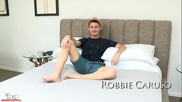 Robbie is ready for some ass-action as he pulls his legs back.