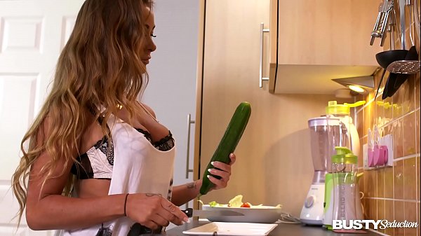 Busty seduction Amanda Rendall rides big green cucumber until she orgasms hard