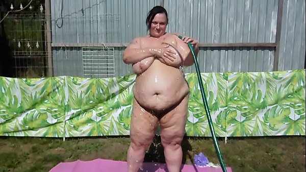 playing with the hose and washing off