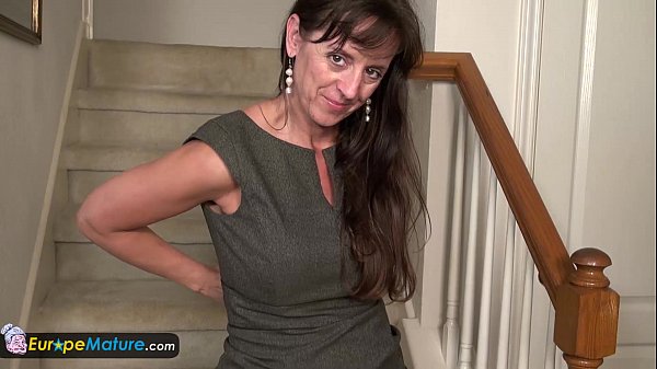 Classy mature lady solo play on staircase