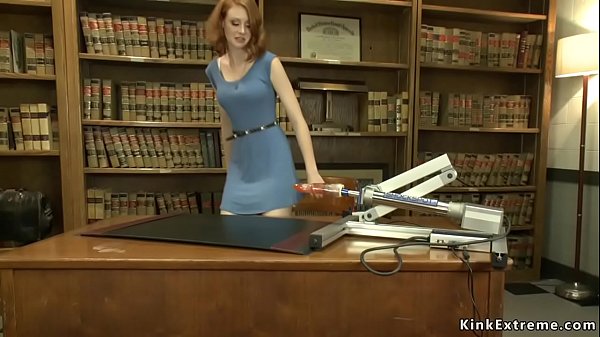 Solo redhead undresses in office and starts her first time sex with The Shockspot machine