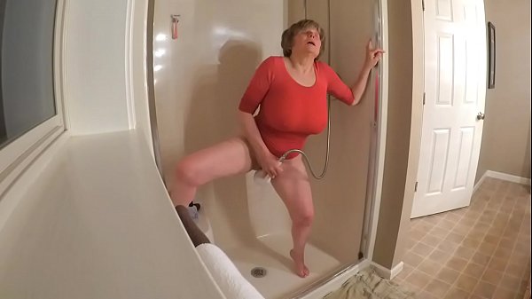 60  GILF masturbating in wet t-shirt