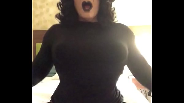 This is a transvestite and her name is  Veronica stocking and she is coming all over the bed by herself her make up and black hose heels black dress with in those luscious lips just make it all worthwhile to watch her Get off and it feels so good