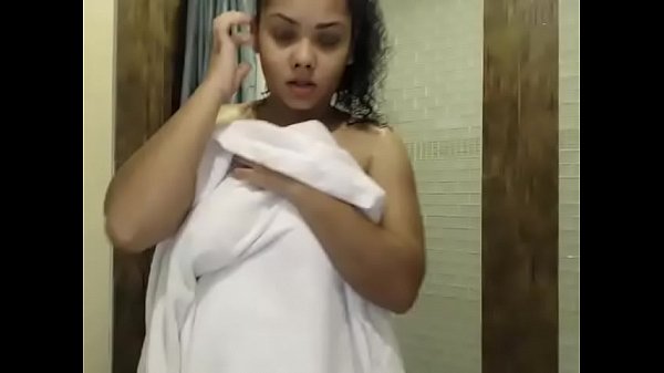 Latina woman taking shower live show