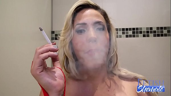 Blonde Shemale Enjoys a Smoke