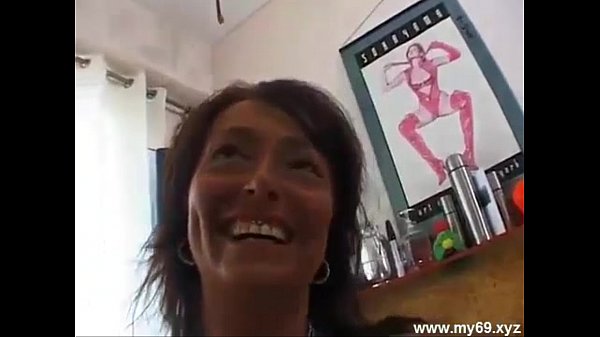 Brunette german MILF with perfect tits plays with cucumber