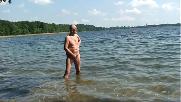 Wanking in the nudist area 4