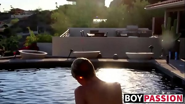 Naughty cutie pulls his dick at the pool