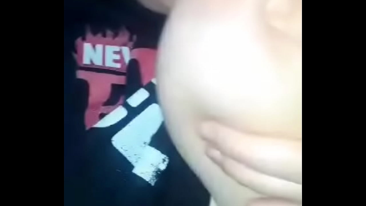 Horny bitch sucking her tittie