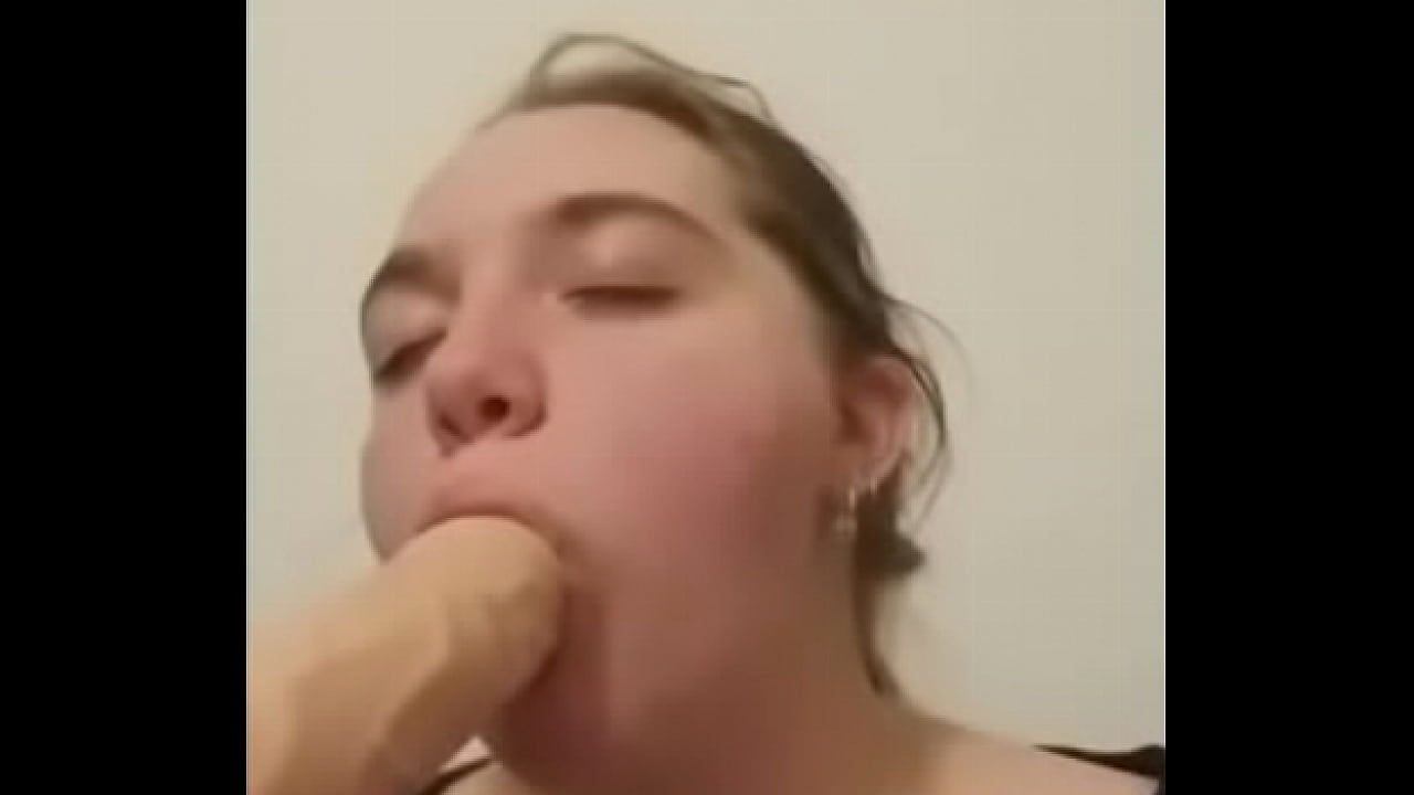 Teen sucking dildo
