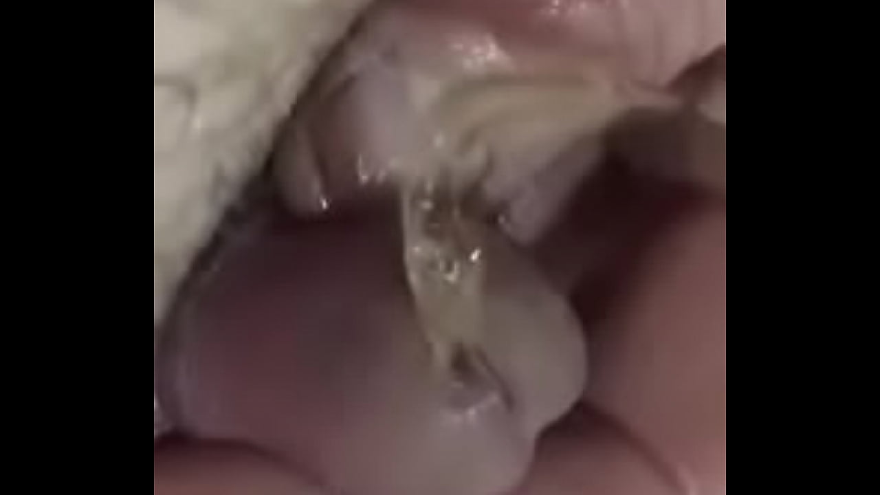 Tiny dick peeing close up