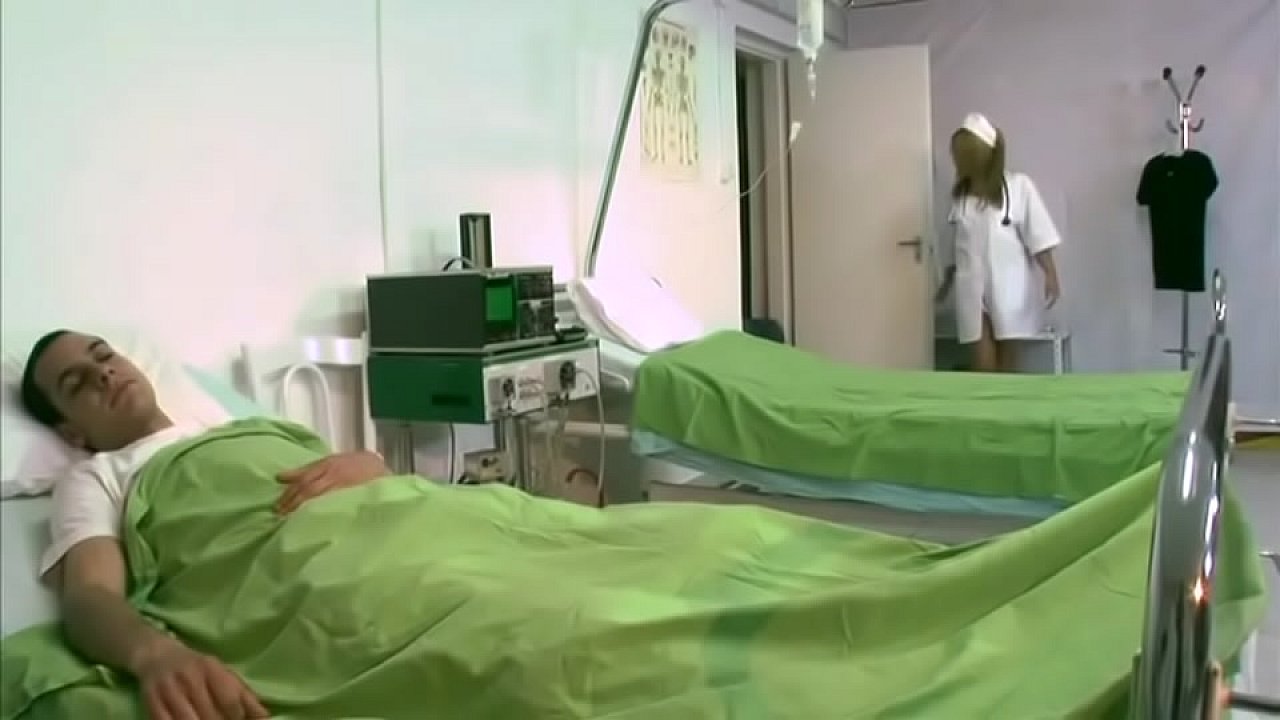 Sexy nurse handling her patient