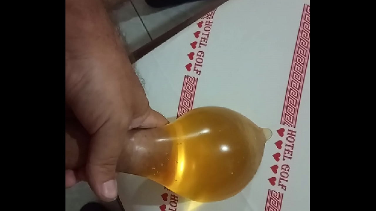 Hard Dick a lot of  piss in condom