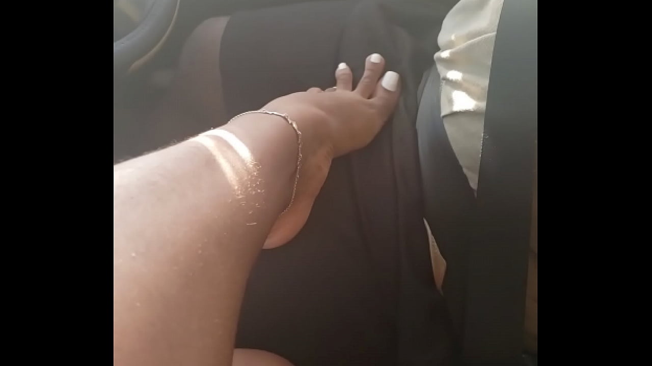 SEXY BIG FEET FOOTJOB IN CAR