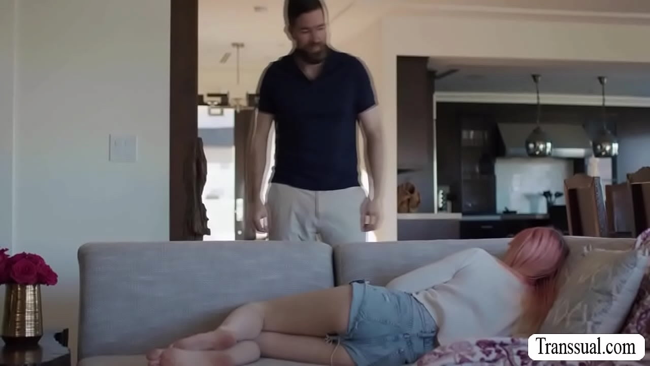Stepfather Chris Epic and his busty TS stepdaughter Mimi Oh are on the couch kissing each othe