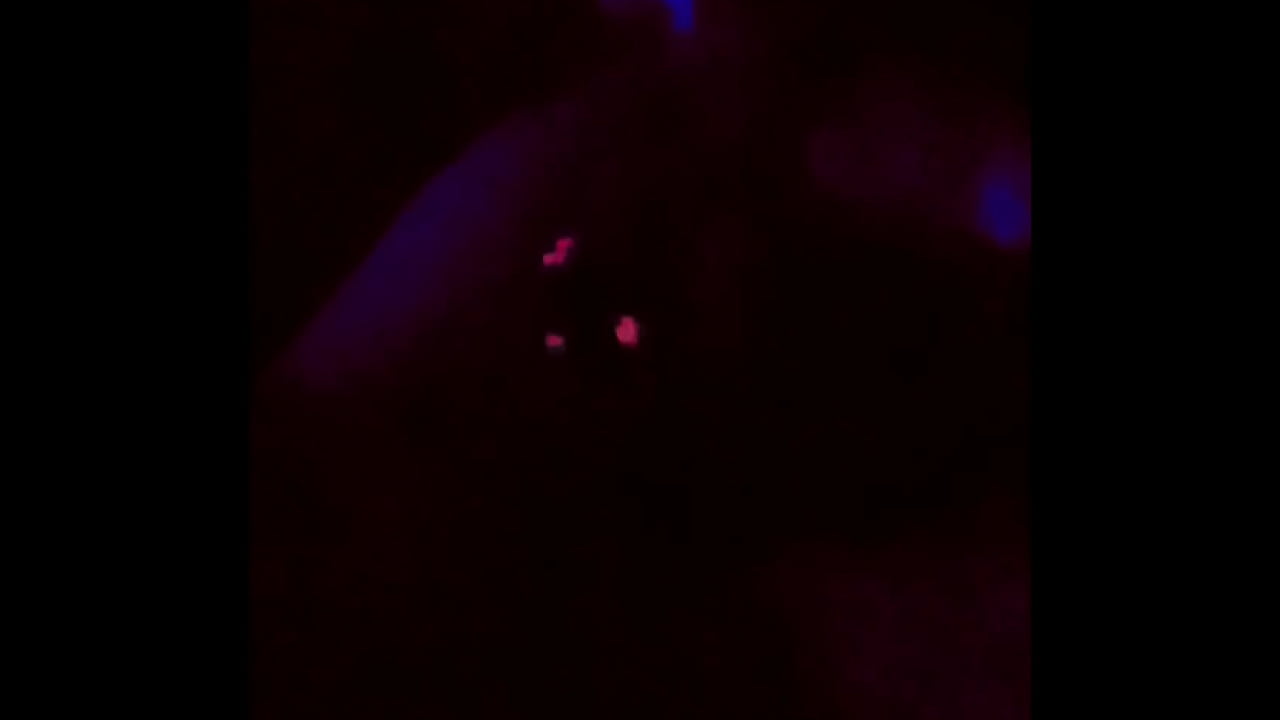 Footjob fun with glowing neon toes