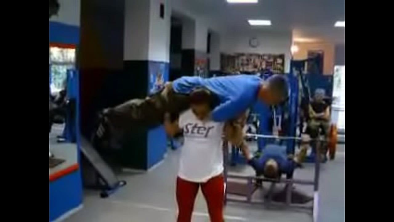 World's Strongest Woman Aneta Florczyk lifting a man