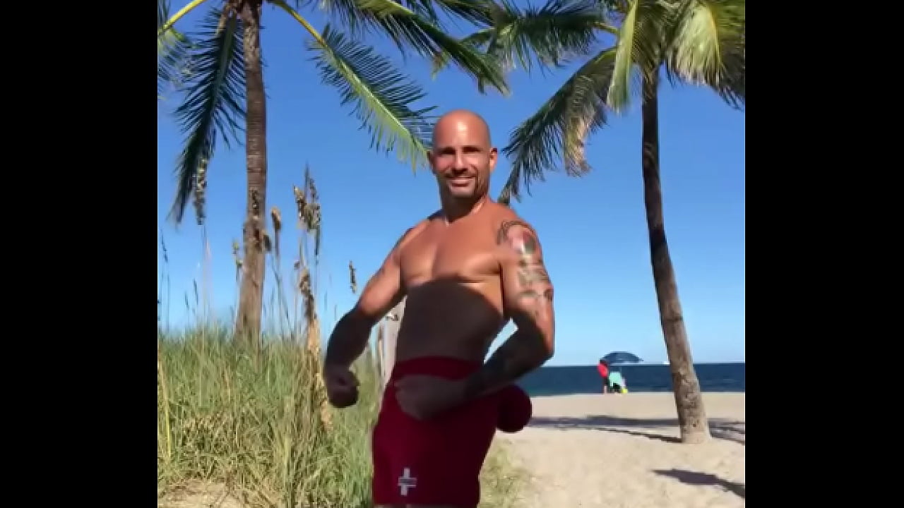 FLEXING AT BEACH