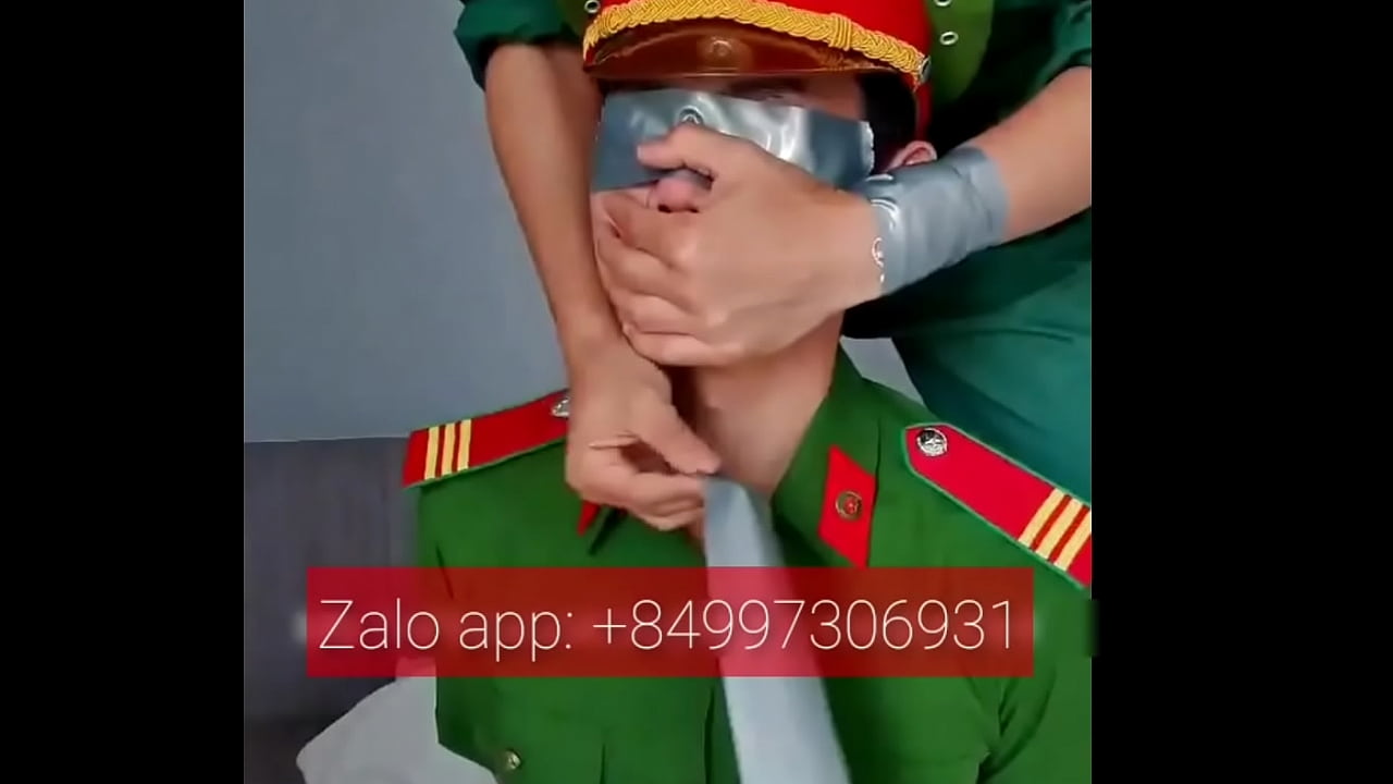 Vietnamese policeman with tape