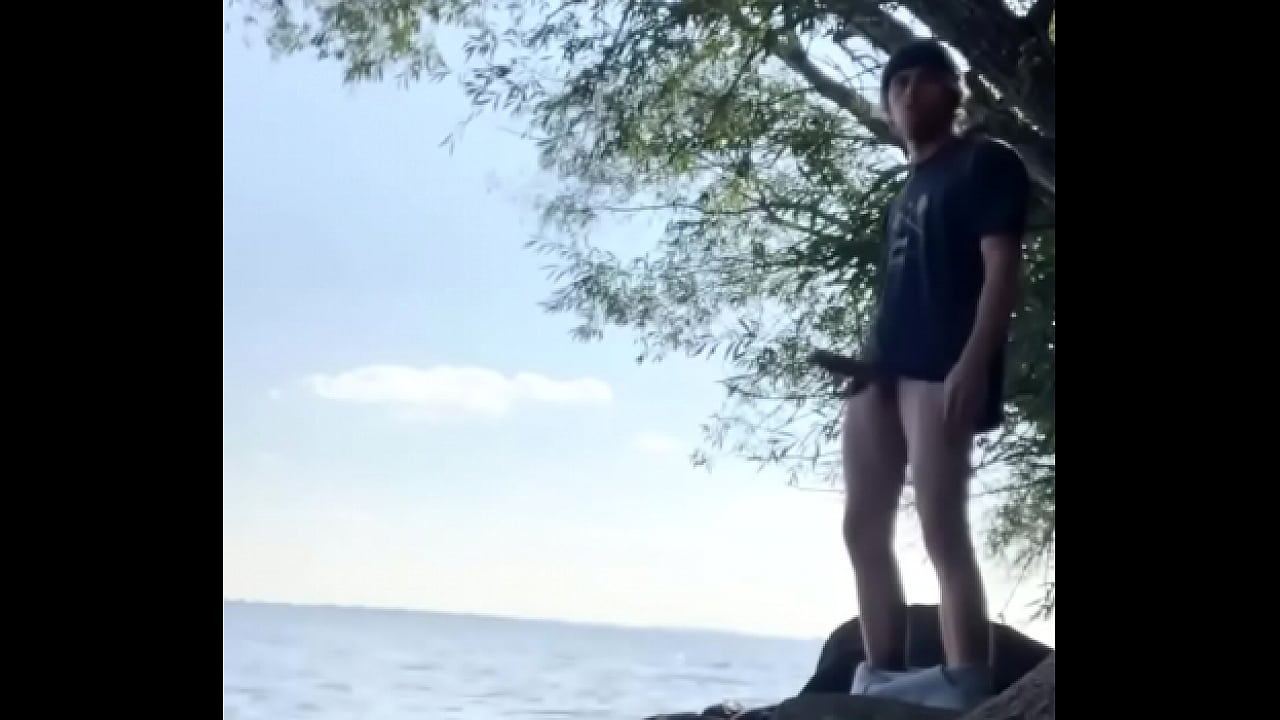 Jerking my fat cock by the lake