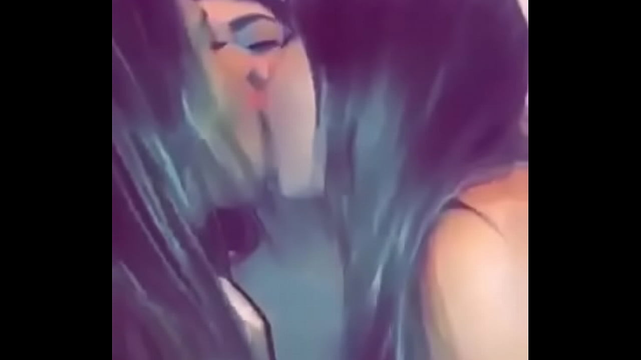 three teens kiss