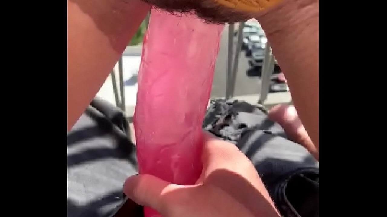 Slut fucking huge dildo in public