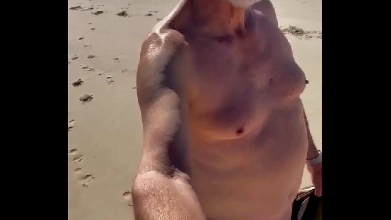 Walking nude on the beach