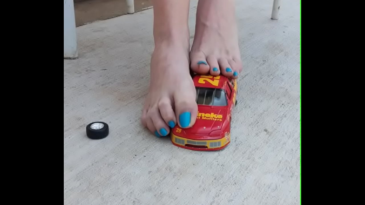 Smashing toy cars with my big sexy soles