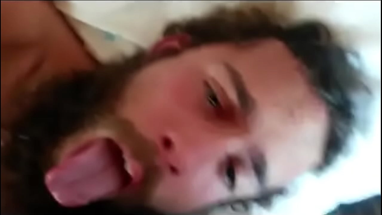 Bearded dude gets shot in the face with jizz from his buddy.