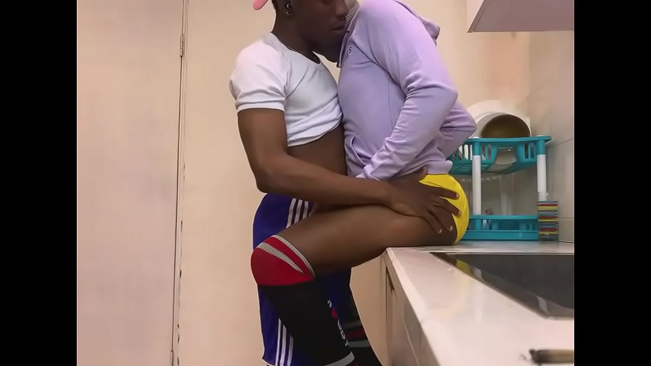 Horny African in kitchen fucking