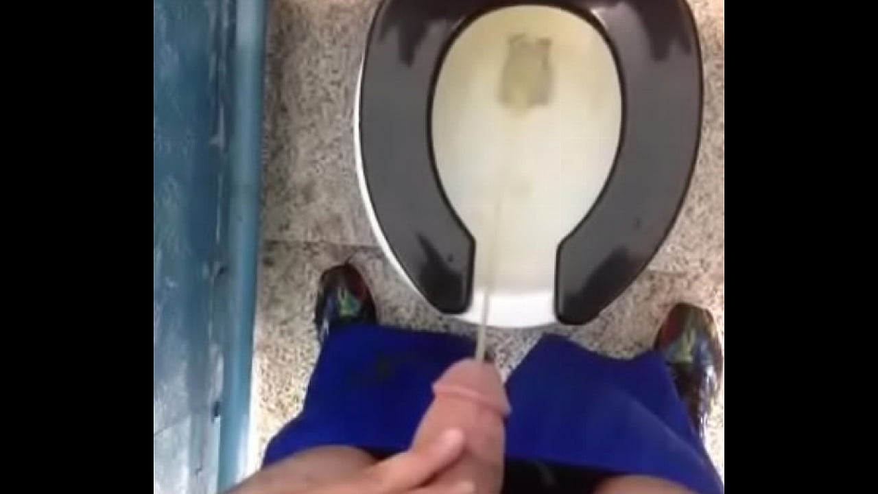 Fresh yellow morning piss in a public toilet