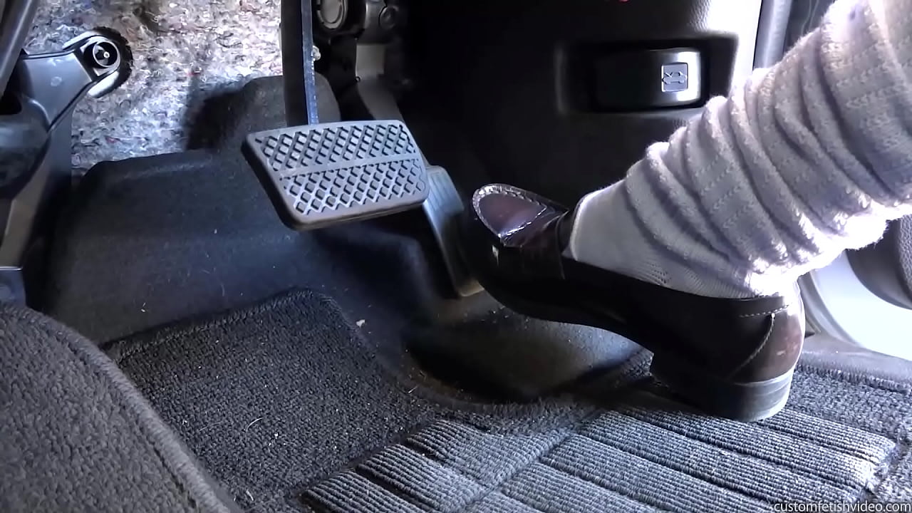 Girl blasting the gas pedal of a car