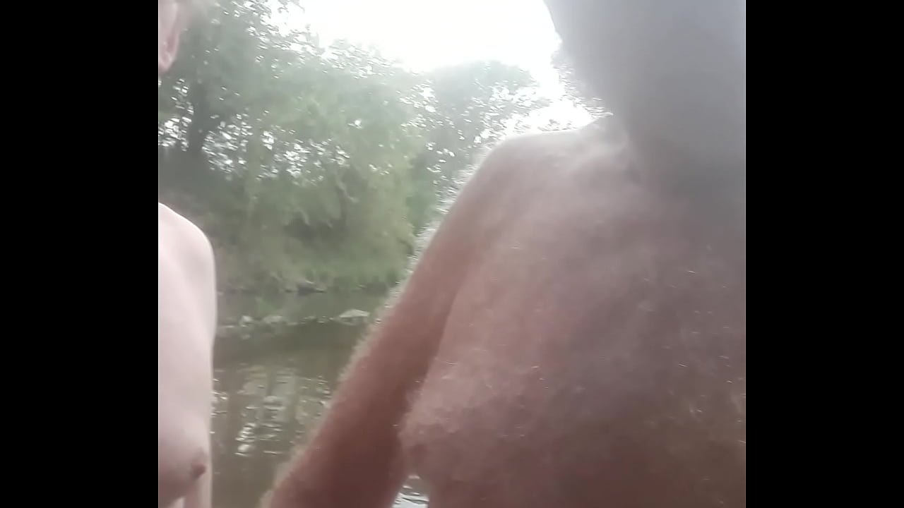 Wading in the river and letting piss flow