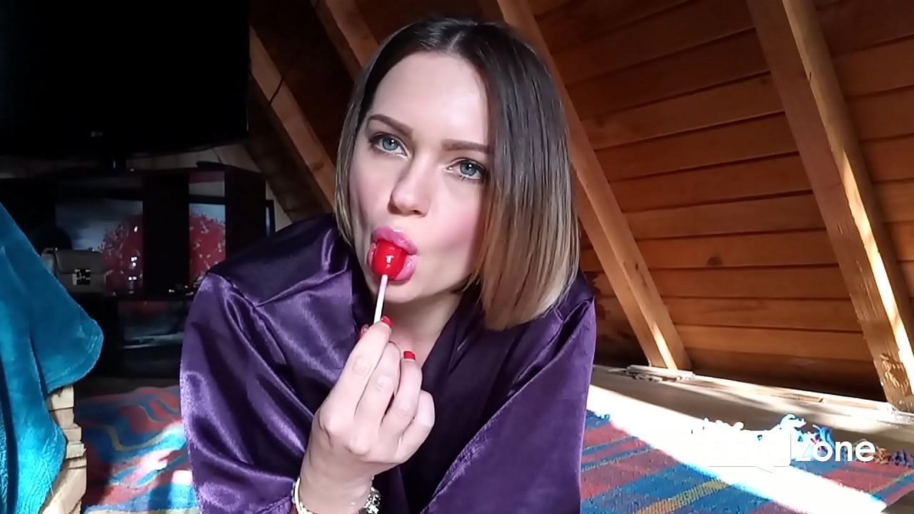 Clit rubbing orgasm with a lollipop in mouth