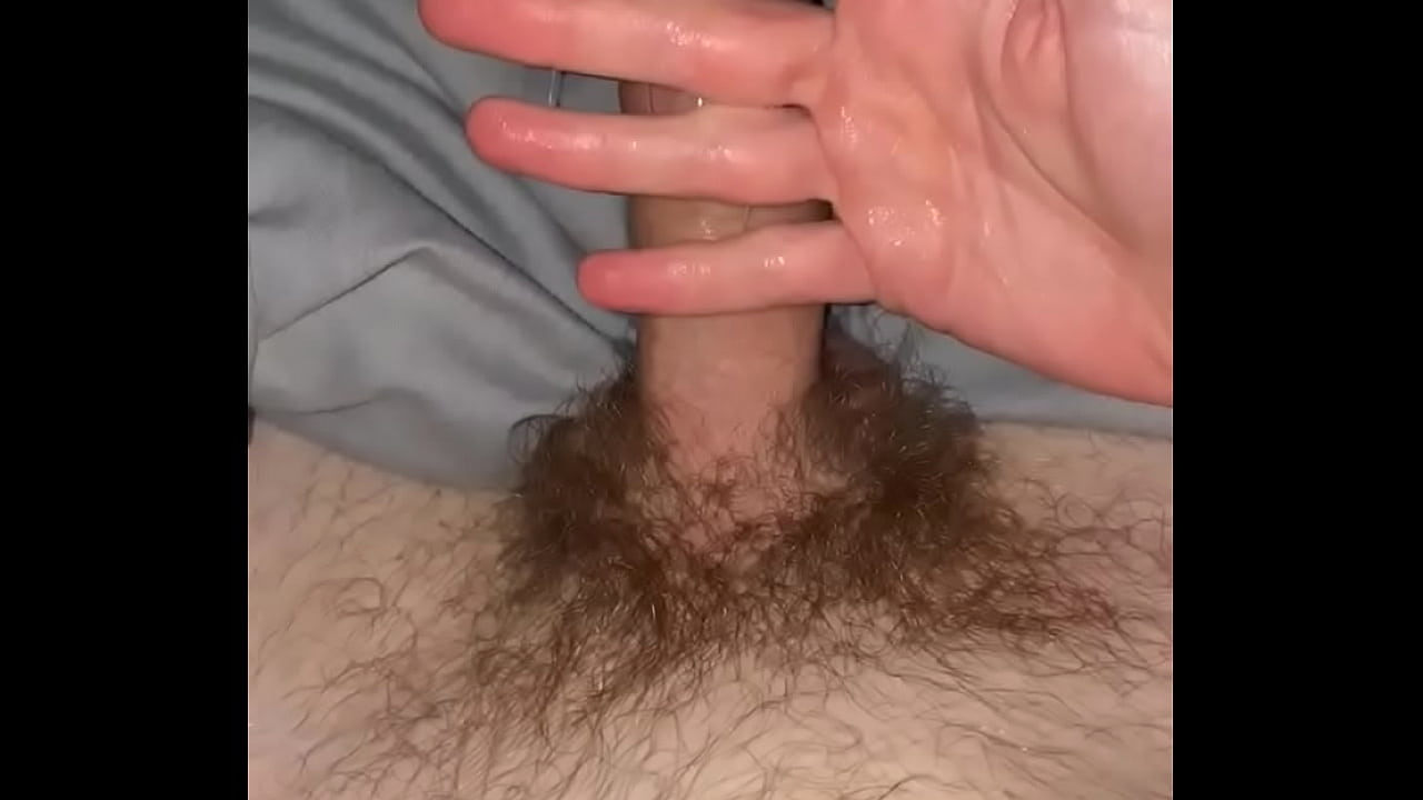 Young boy masturbates using his own cum